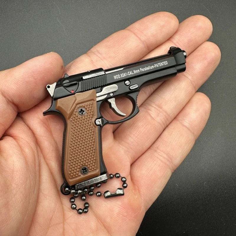 Mini pistola de brinquedo em l - Model Kit Revolver avaliação e preço